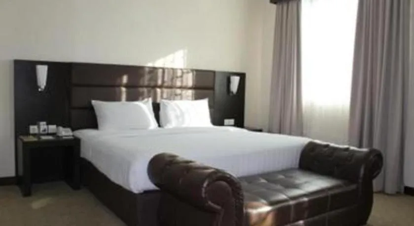 Bed in The BCC Hotel & Residence