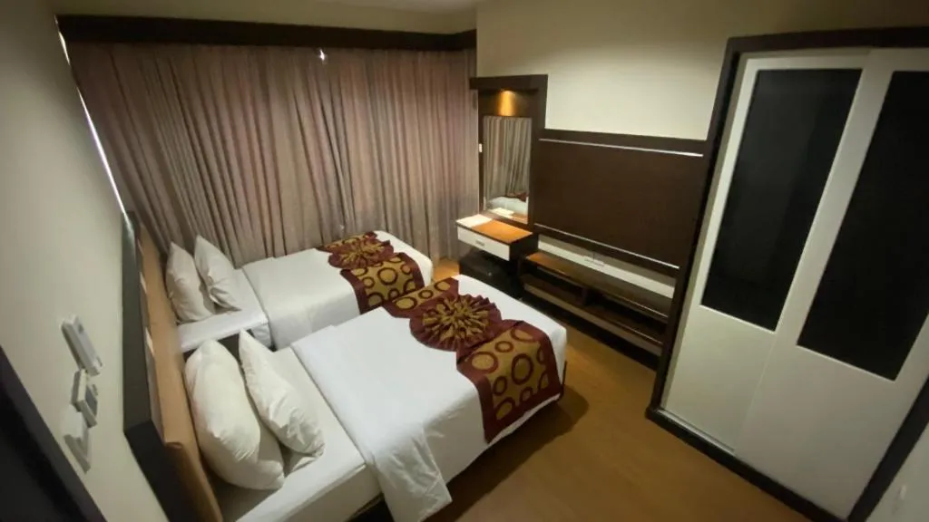 Bed in The BCC Hotel & Residence