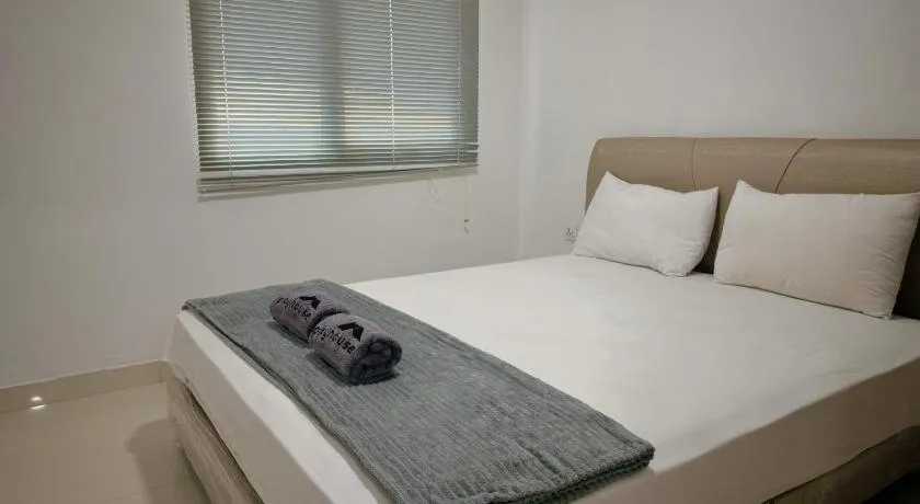 Bed in The BCC Hotel & Residence