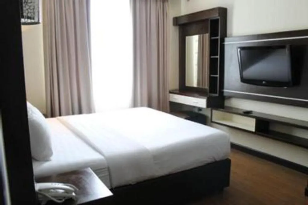 Bed in The BCC Hotel & Residence