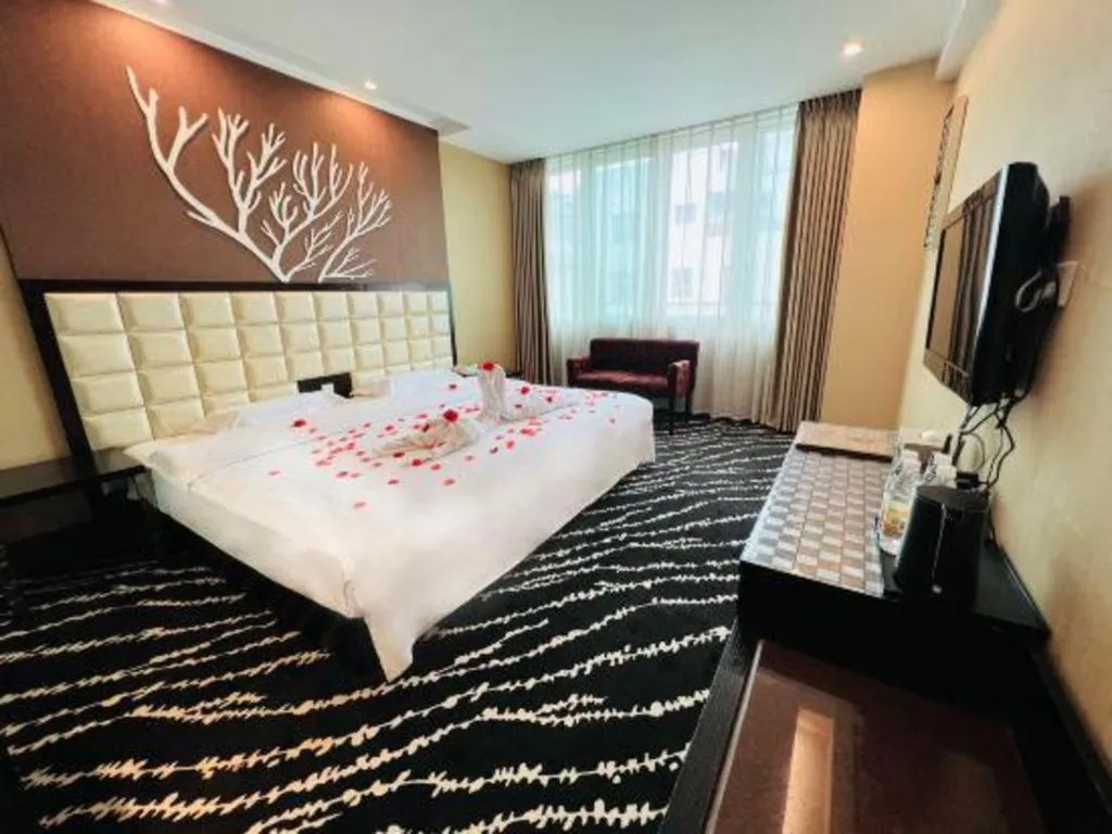 Bed in Kunming Long Way Hotel