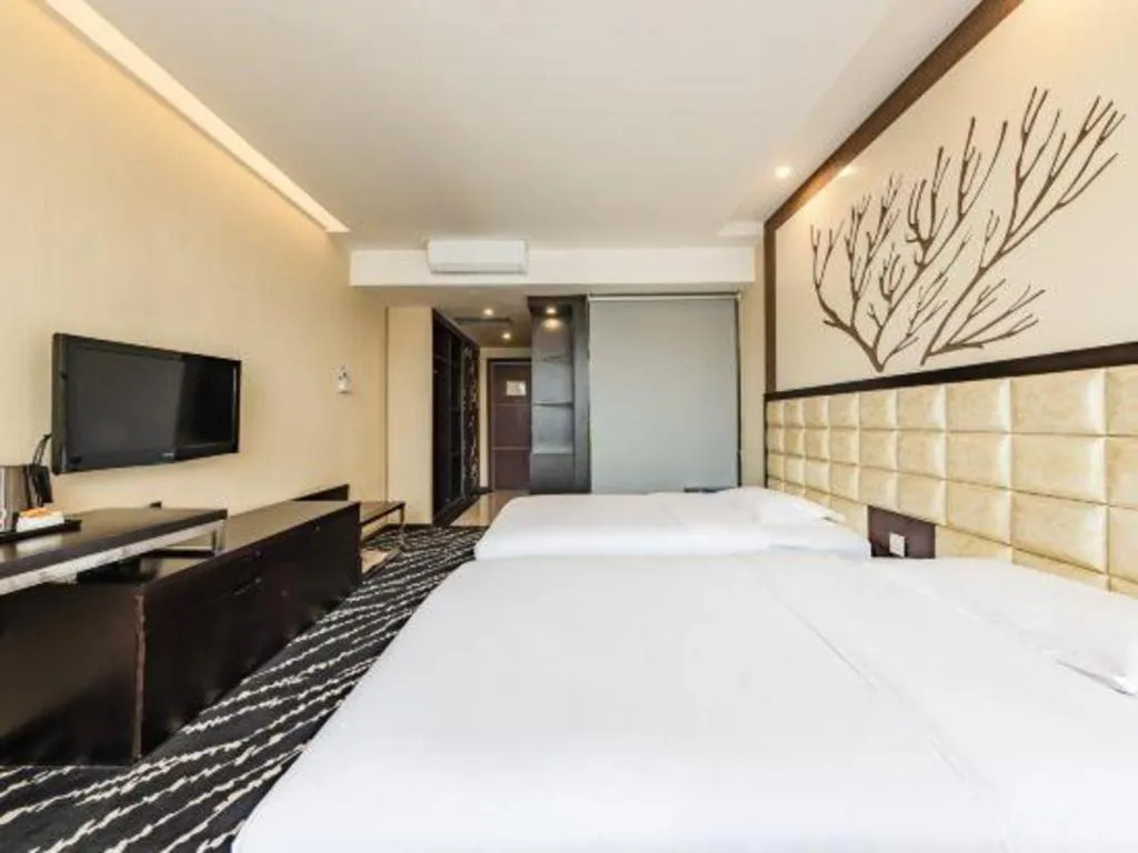 Bed in Kunming Long Way Hotel