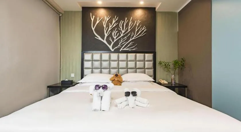 Bed in Kunming Long Way Hotel