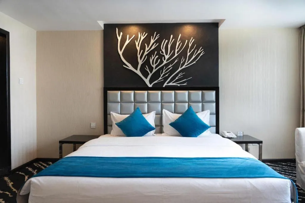 Bed in Kunming Long Way Hotel