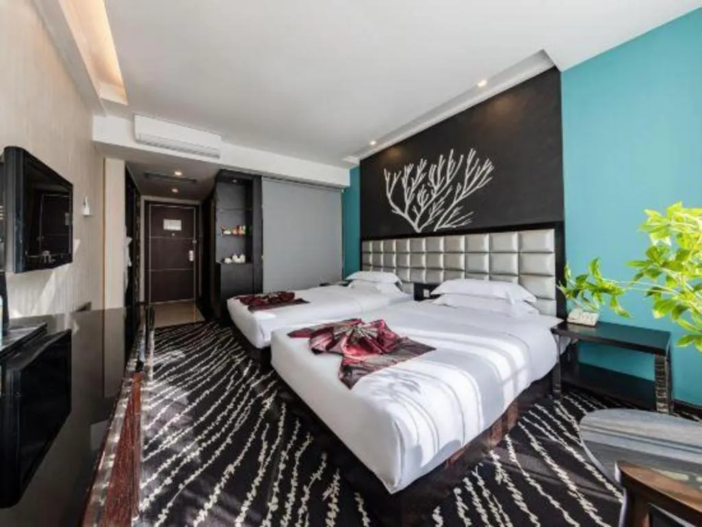 Bed in Kunming Long Way Hotel