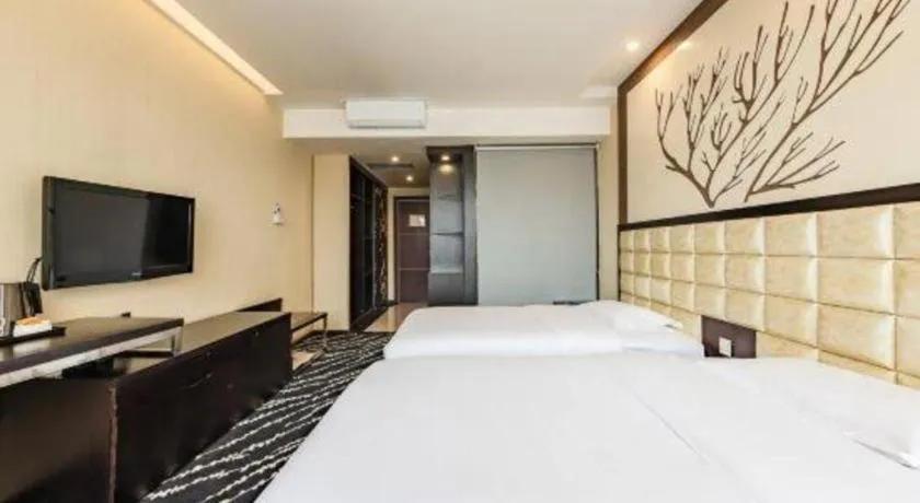 Bed in Kunming Long Way Hotel