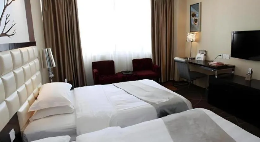 Bed in Kunming Long Way Hotel