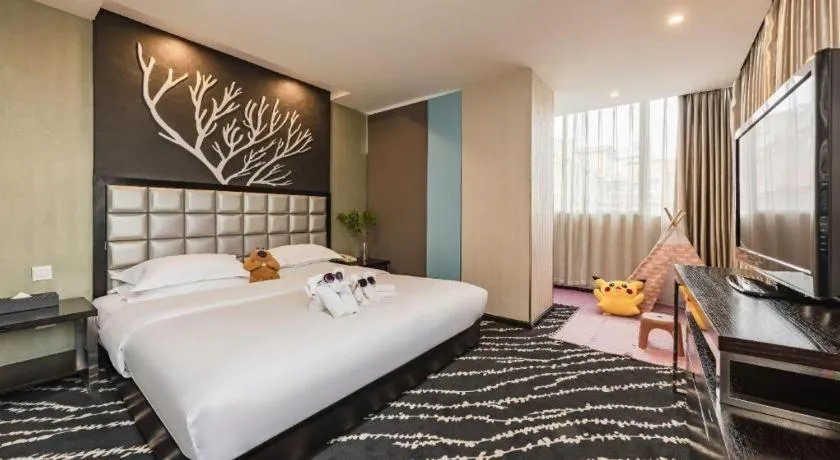 Bed in Kunming Long Way Hotel