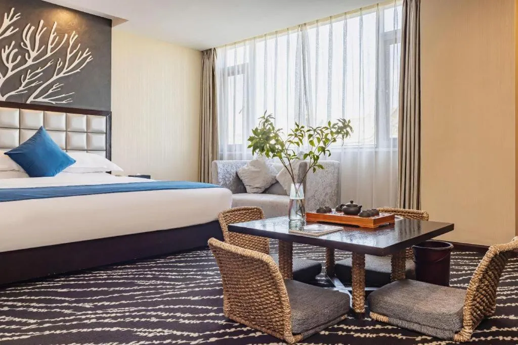 Bed in Kunming Long Way Hotel