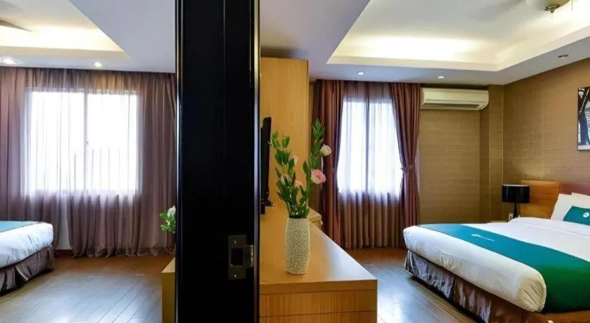 Bed in AHA Boutique Ben Thanh Hotel