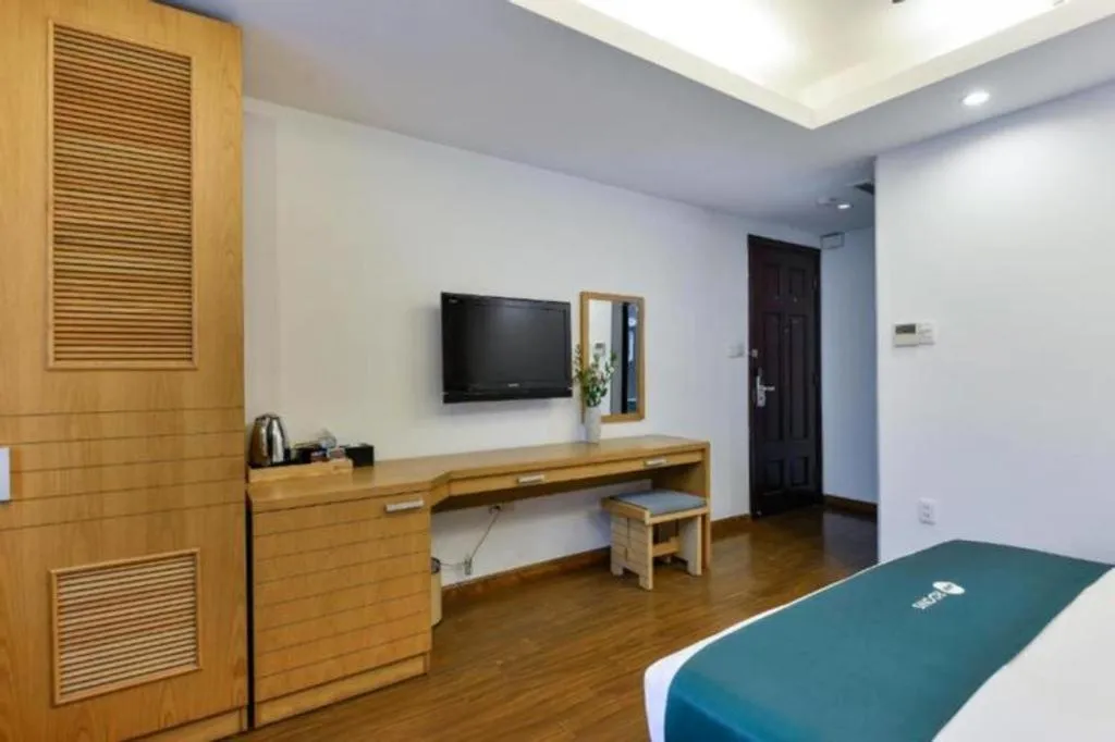 Bed in AHA Boutique Ben Thanh Hotel