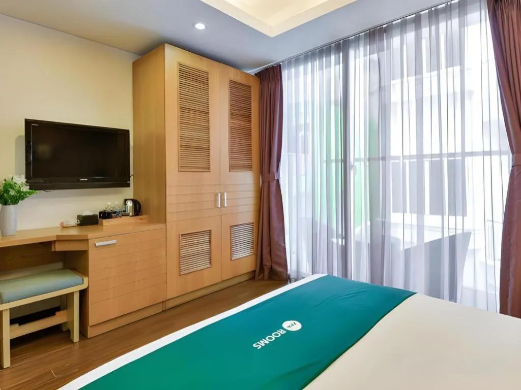 Bed in AHA Boutique Ben Thanh Hotel