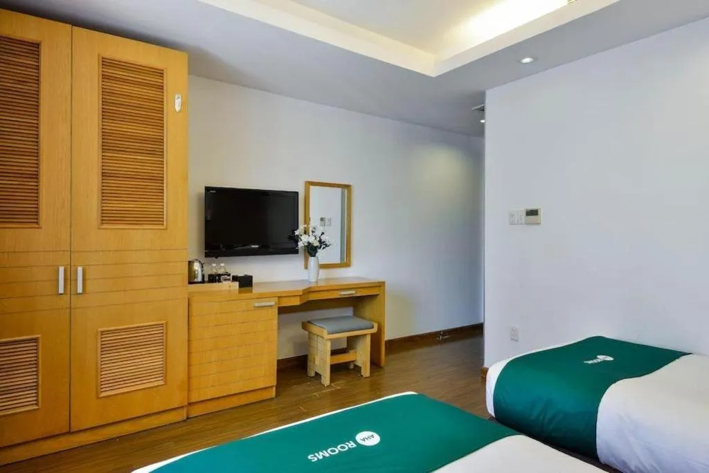 Bed in AHA Boutique Ben Thanh Hotel