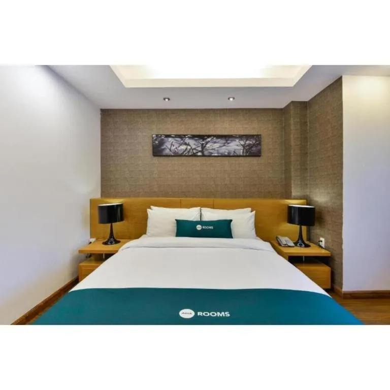 Bed in AHA Boutique Ben Thanh Hotel