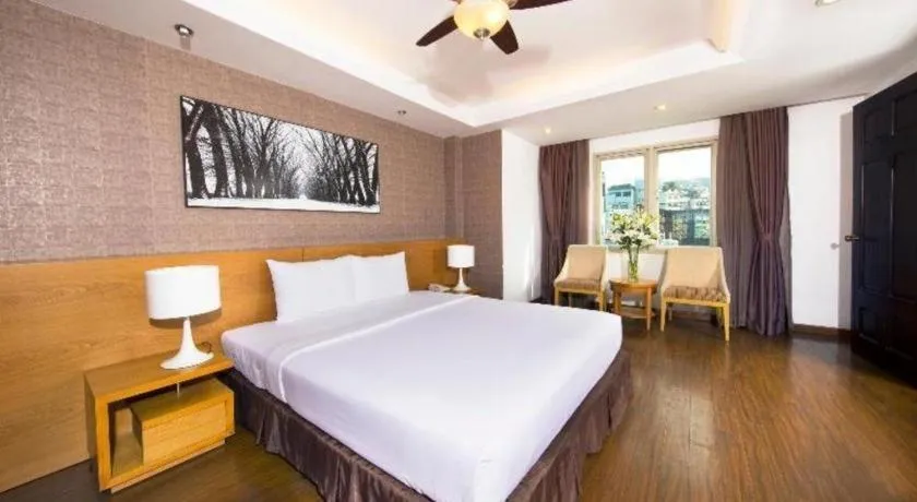 Bed in AHA Boutique Ben Thanh Hotel