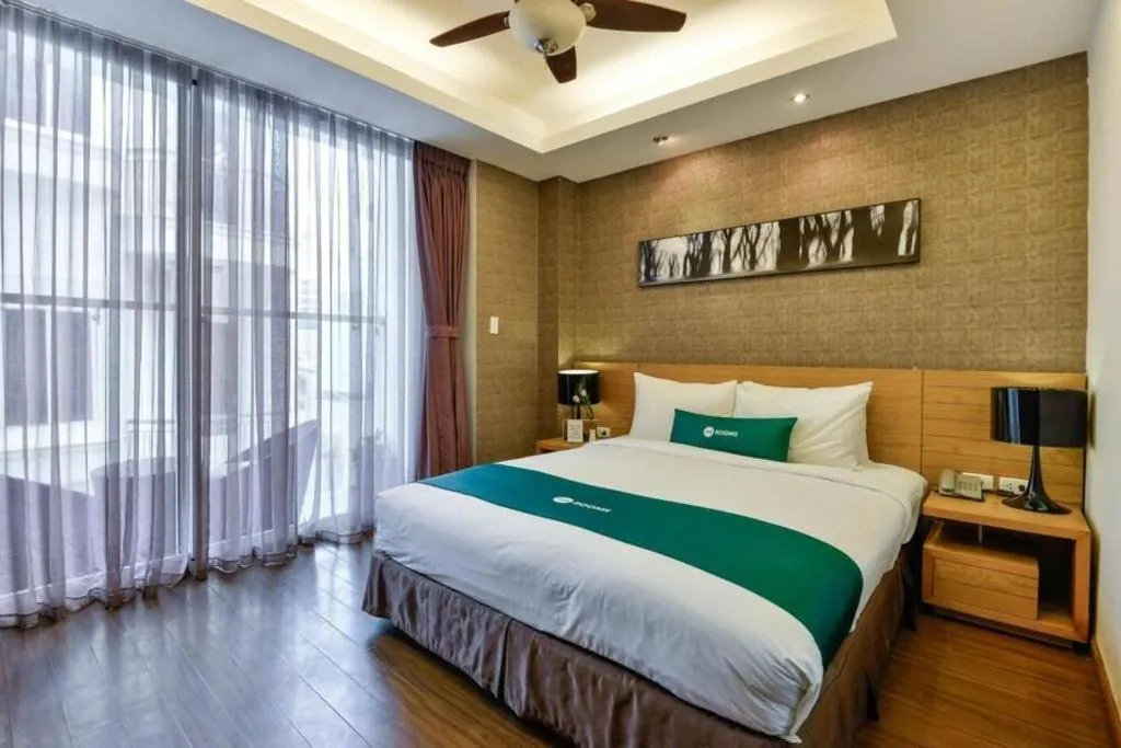 Bed in AHA Boutique Ben Thanh Hotel