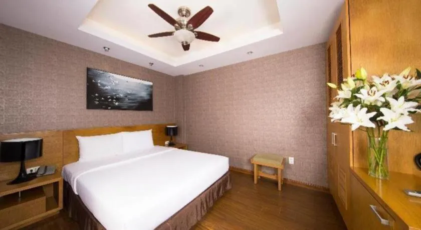 Bed in AHA Boutique Ben Thanh Hotel