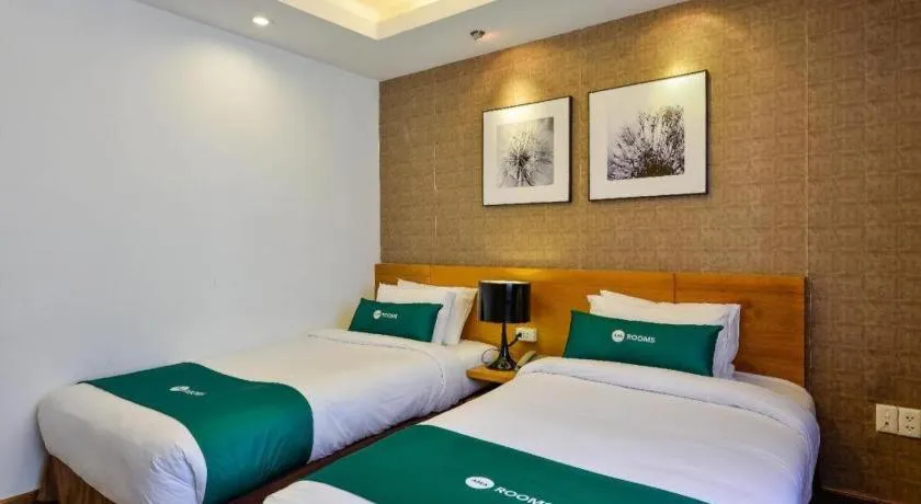 Bed in AHA Boutique Ben Thanh Hotel