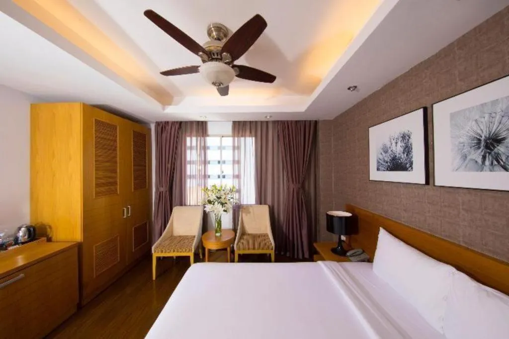 Bed in AHA Boutique Ben Thanh Hotel