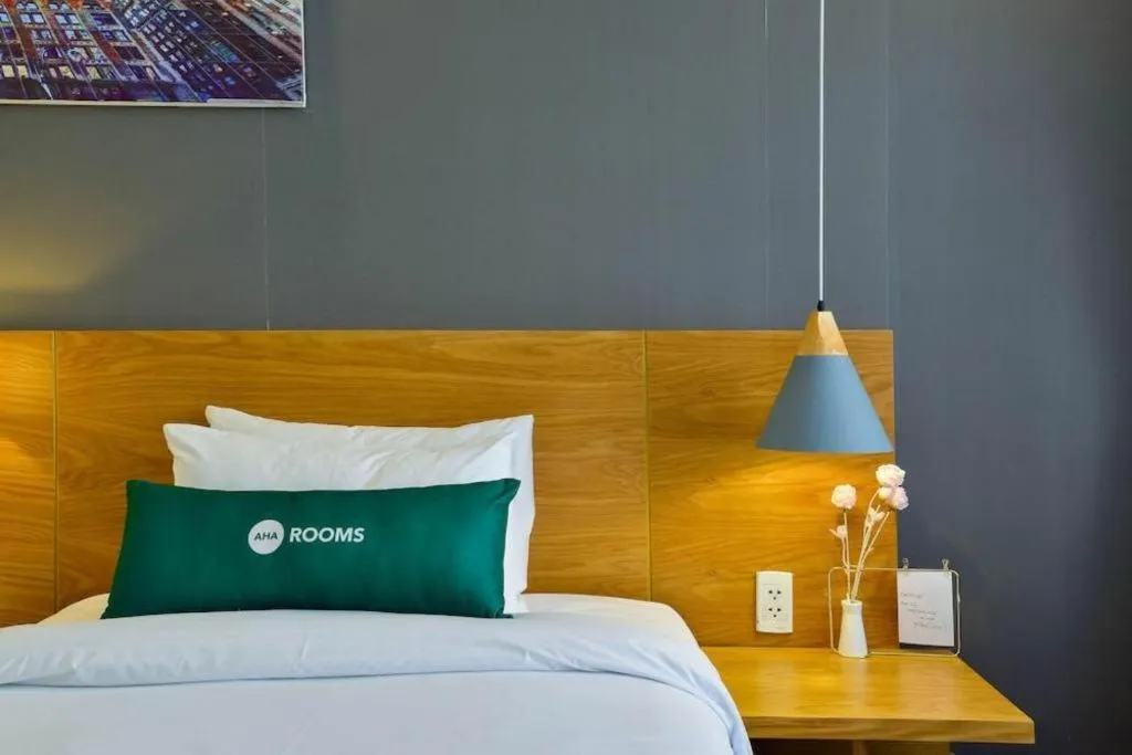 Bed in AHA Boutique Ben Thanh Hotel