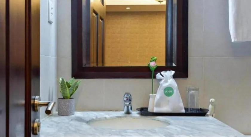 Bed in AHA Boutique Ben Thanh Hotel