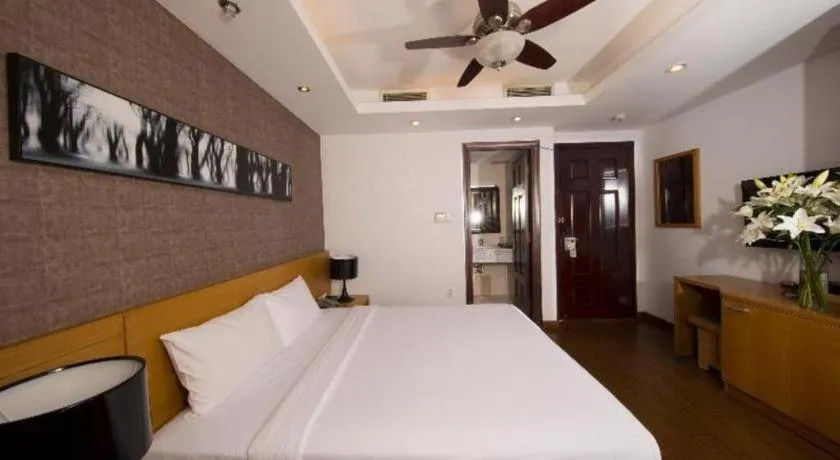 Bed in AHA Boutique Ben Thanh Hotel