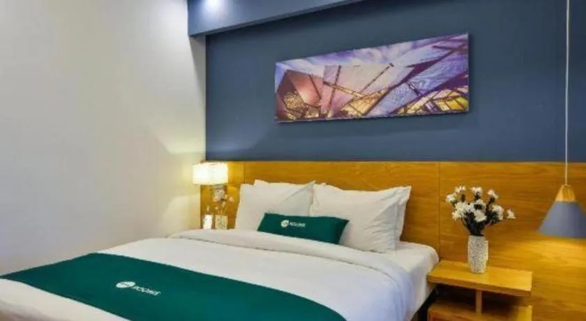 Bed in AHA Boutique Ben Thanh Hotel