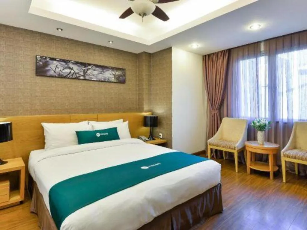 Bed in AHA Boutique Ben Thanh Hotel