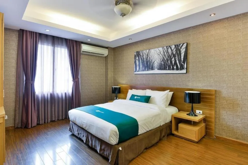 Bed in AHA Boutique Ben Thanh Hotel