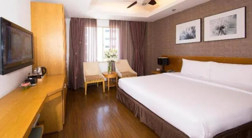 Bed in AHA Boutique Ben Thanh Hotel