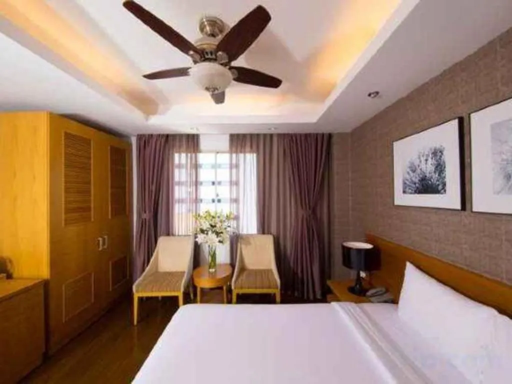 Bed in AHA Boutique Ben Thanh Hotel