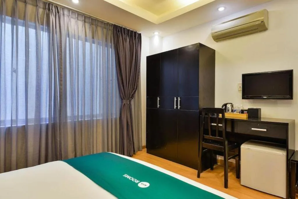 Bed in AHA Boutique Ben Thanh Hotel