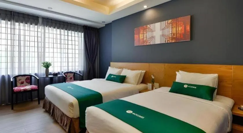 Bed in AHA Boutique Ben Thanh Hotel