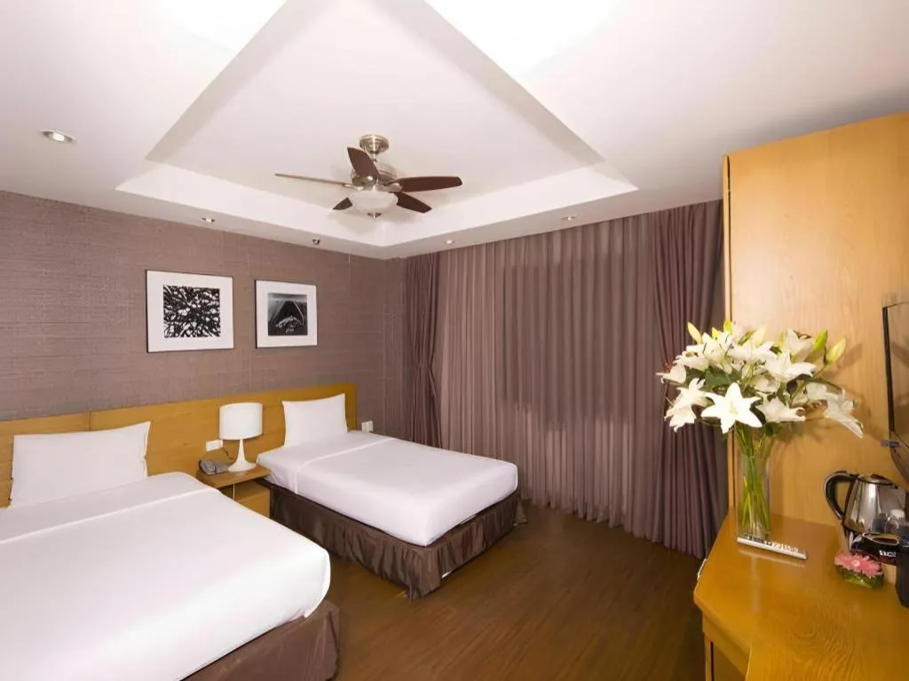 Bed in AHA Boutique Ben Thanh Hotel