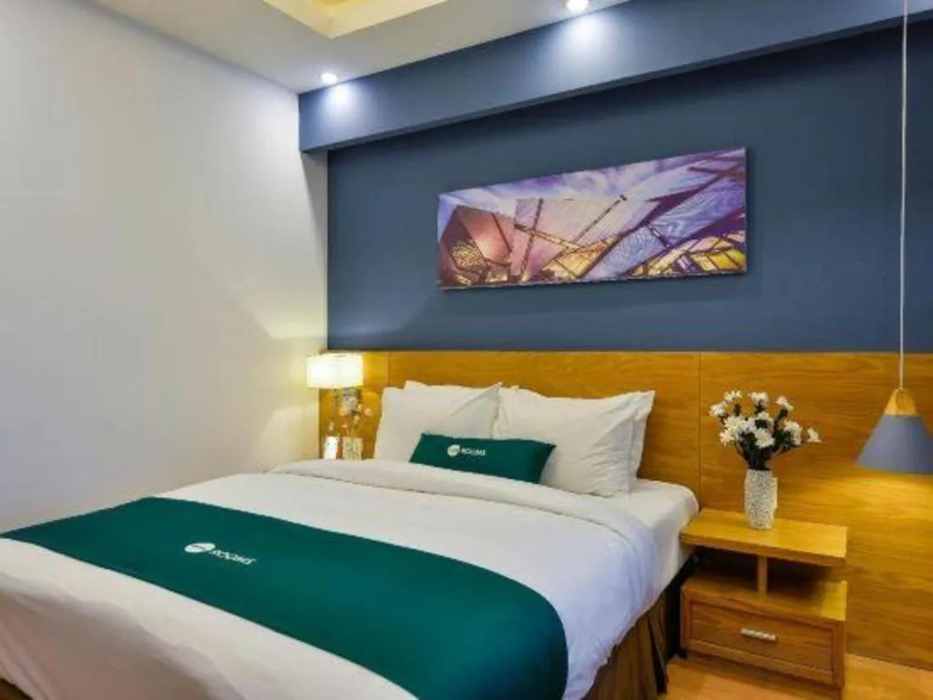 Bed in AHA Boutique Ben Thanh Hotel