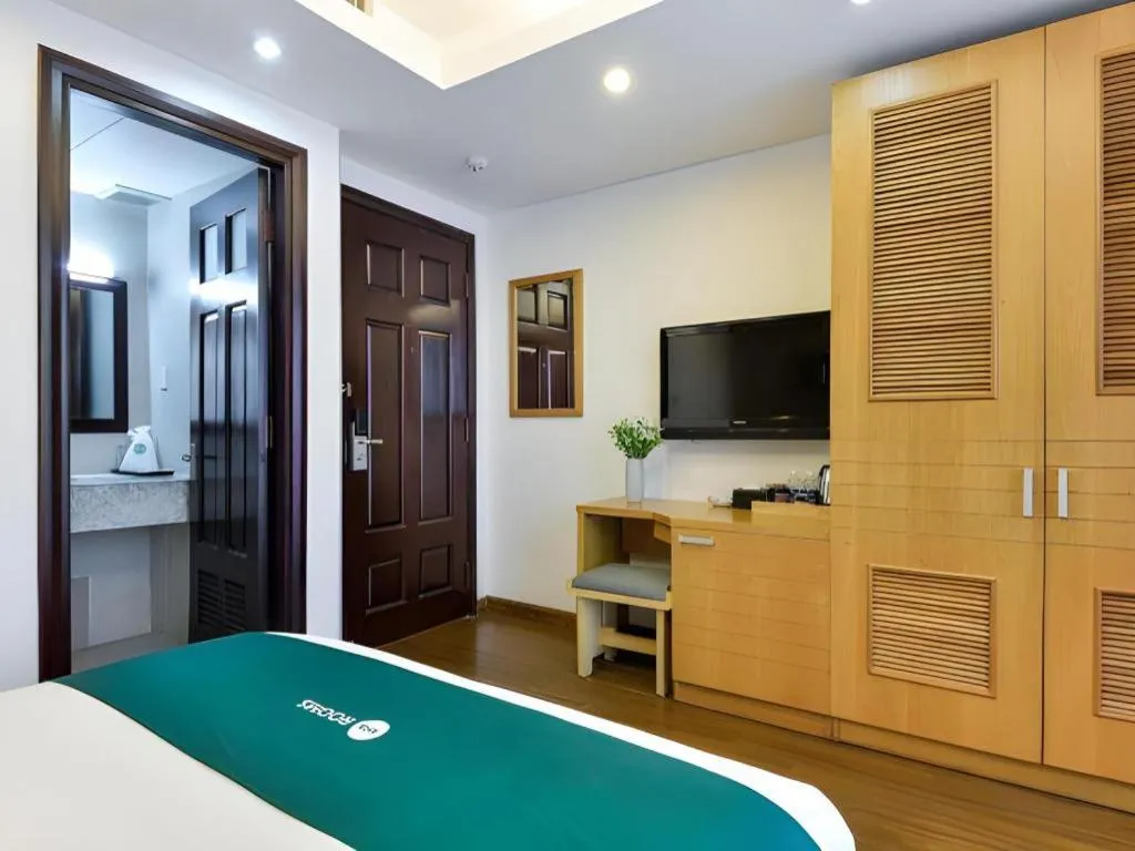 Bed in AHA Boutique Ben Thanh Hotel