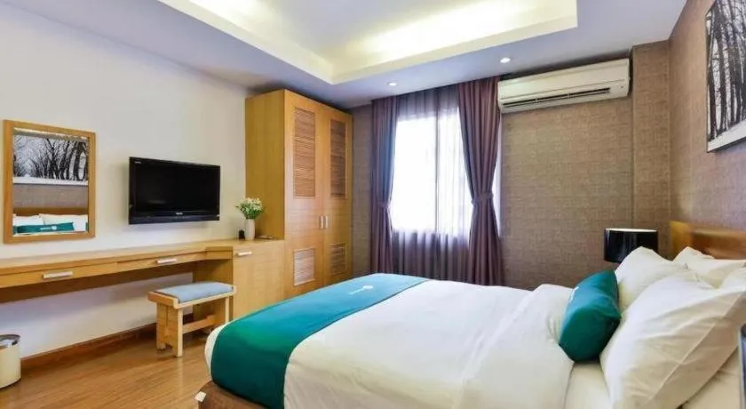 Bed in AHA Boutique Ben Thanh Hotel