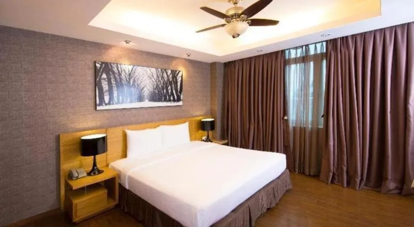 Bed in AHA Boutique Ben Thanh Hotel