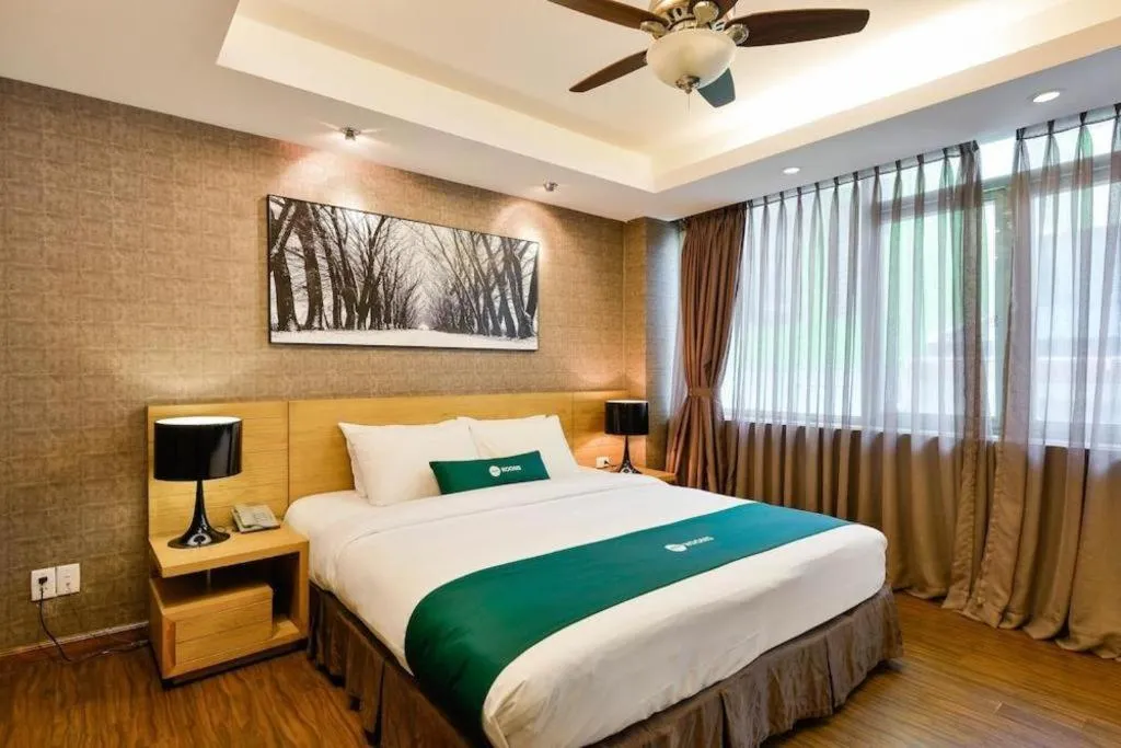 Bed in AHA Boutique Ben Thanh Hotel