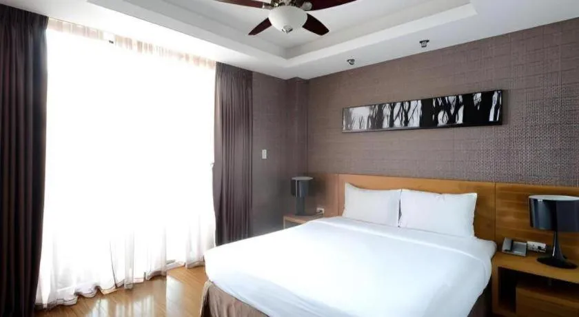 Bed in AHA Boutique Ben Thanh Hotel
