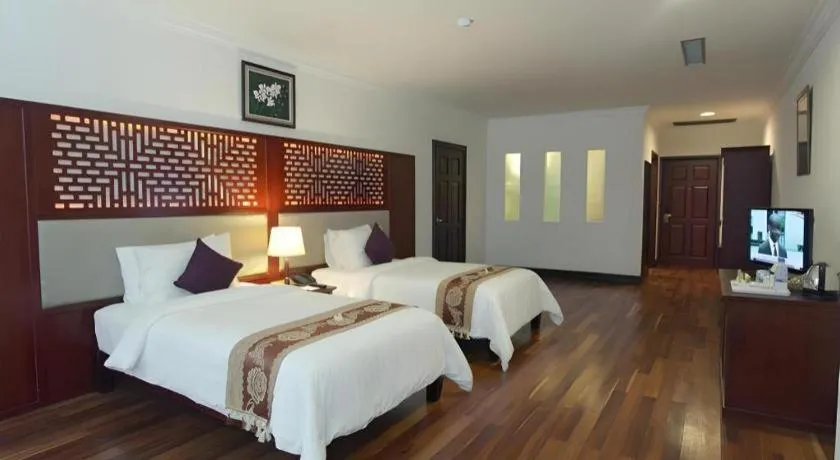 Bed in Sokhalay Angkor Residence and Spa
