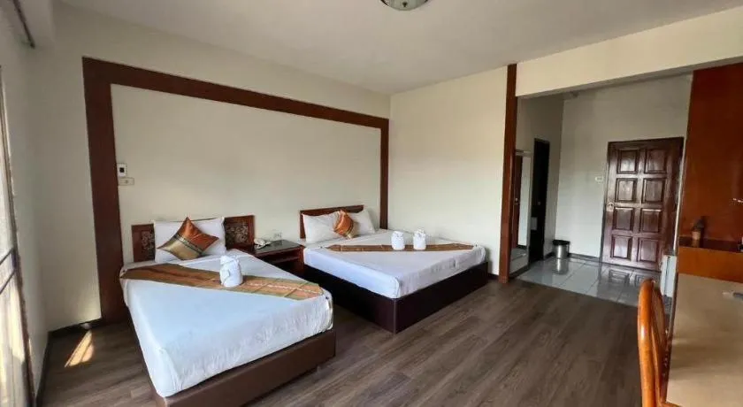 Bed in Chao Phya Grand Hotel