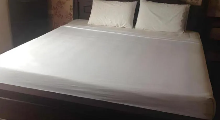 Bed in Chao Phya Grand Hotel