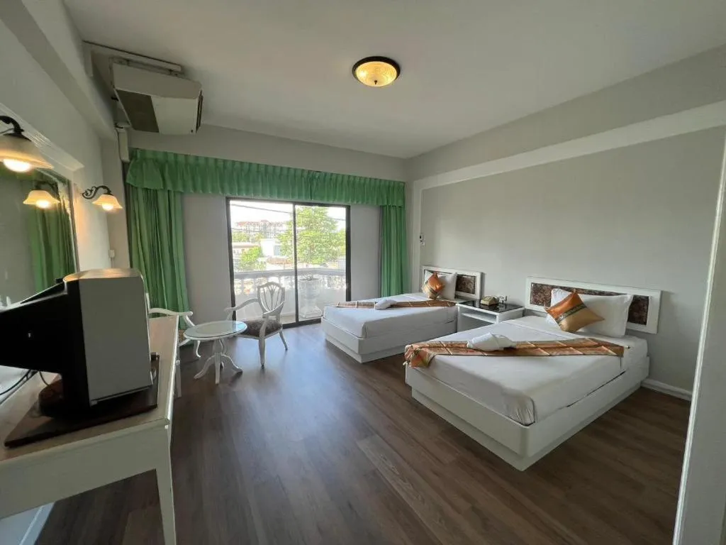 Bed in Chao Phya Grand Hotel