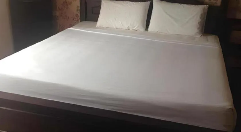 Bed in Chao Phya Grand Hotel