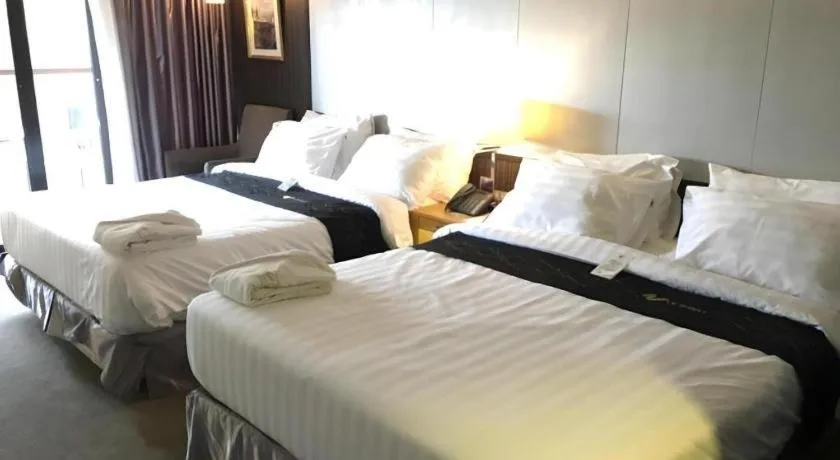 Bed in Le Monet Hotel