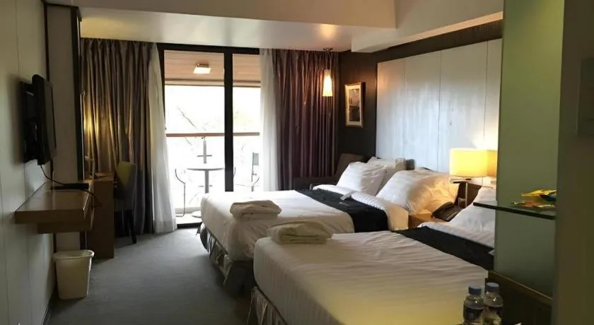 Bed in Le Monet Hotel