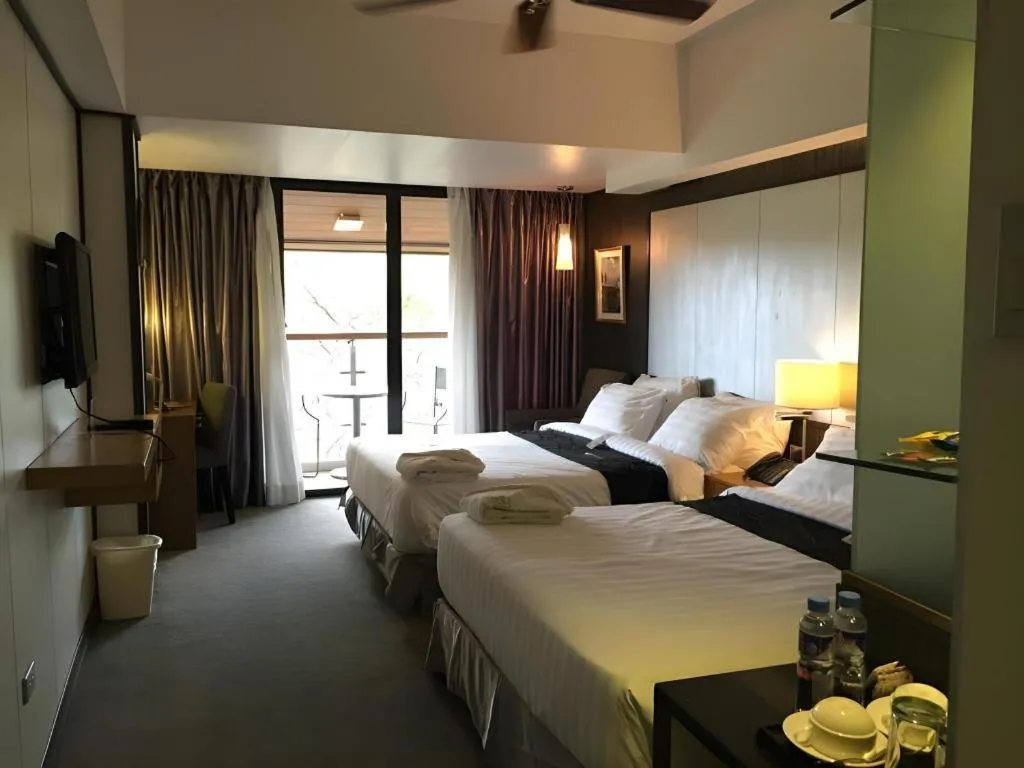 Bed in Le Monet Hotel