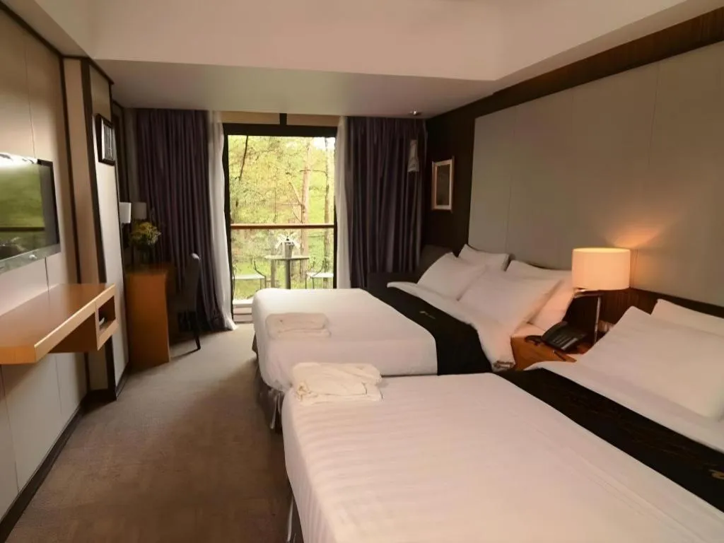 Bed in Le Monet Hotel