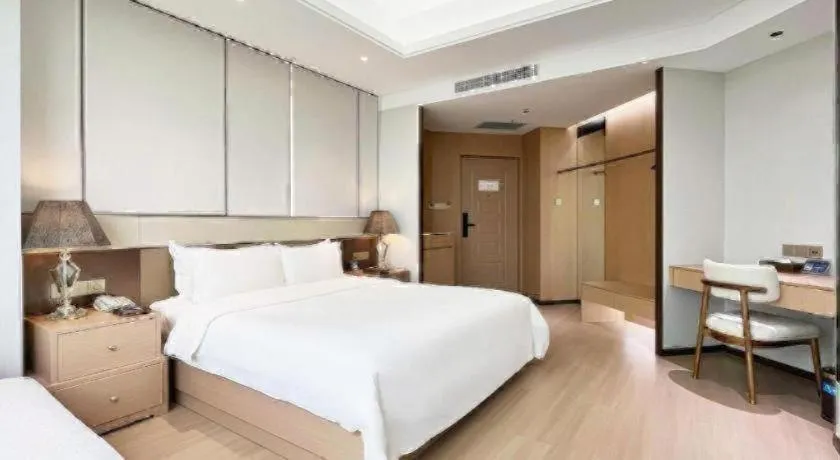 Bed in Howard Johnson by Wyndham Sunshine Plaza Ningbo